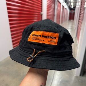 Heron Preston Black Hat with Orange Patch
